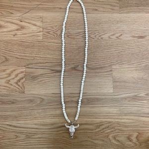 Beaded necklace with skull pendant